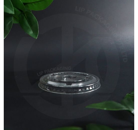 Transparent plastic Flat Lid F78 (78mm diameter) on a stack, designed for use with PET 8oz disposable cups.