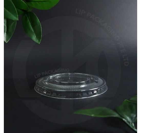 Stack of transparent 93mm Flat Lids F93 for 12oz PET disposable beverage cups.