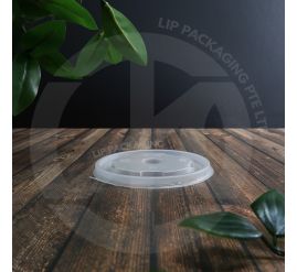 Stack of 100mm flat, clear plastic lids (FL260) ready to seal small paper food containers (260ml).