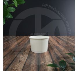Stack of 3oz disposable white paper pulp condiment bowls, suitable for hot or cold food samples.