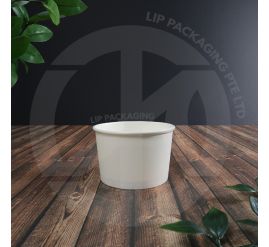 Stack of 5oz disposable white paper bowls, showcasing their plain design and heavy-duty, liquid-proof construction.