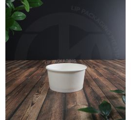 Empty white 4oz disposable paper bowl with a clean rim, emphasizing its suitability as an ice cream or soup cup.