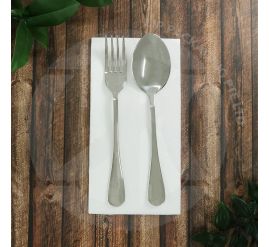 A stack of neatly folded white Premium Quilted Dinner Napkins (40x40cm), showing the embossed, soft texture for a fine dining restaurant setting.