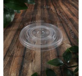 Stack of 110mm clear plastic flat lids (520A) for medium-sized takeaway paper bowls.